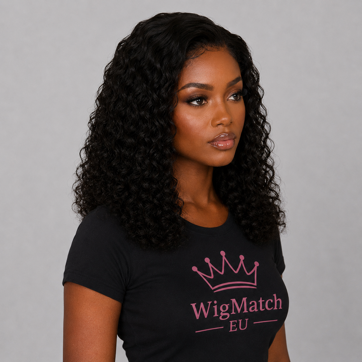Three-quarter angle of a 4x4 Curly Lace Closure Human Hair Wig highlighting defined curls, natural movement, and a realistic hairline on a dark-skinned model, WigMatch EU 