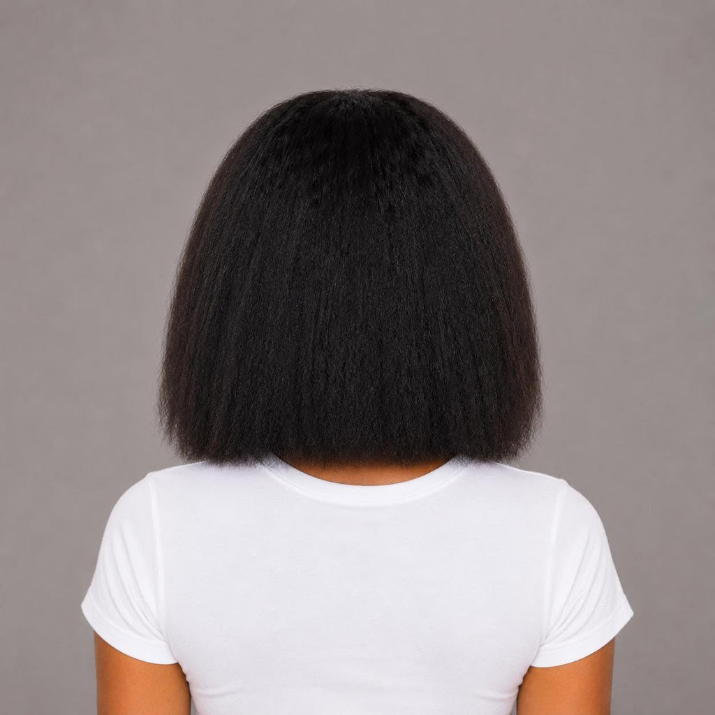 Woman showcasing the back view of the WigMatch Kinky Straight Human Hair Lace Front Wig, displaying a smooth natural finish, available online with free EU shipping from the WigMatch European online store.