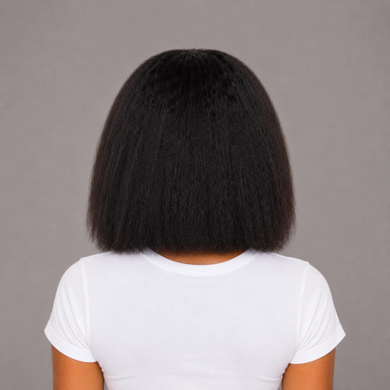 Woman showcasing the back view of the WigMatch Kinky Straight Human Hair Lace Front Wig, displaying a smooth natural finish, available online with free EU shipping from the WigMatch European online store.