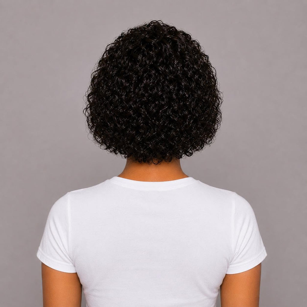 WigMatch short curly human hair wig back view displaying full natural curls and even density. Available online with fast free shipping across the European Union.