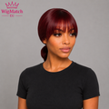 Woman wearing the Short Burgundy Red Straight Human Hair Bob Wig with Full Bangs, showcasing the smooth straight texture, rich burgundy red shade, full bangs, natural movement, and a clean left-side profile.